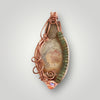 Corral Fossilized Gemstone  Pendant with Metallic Beads